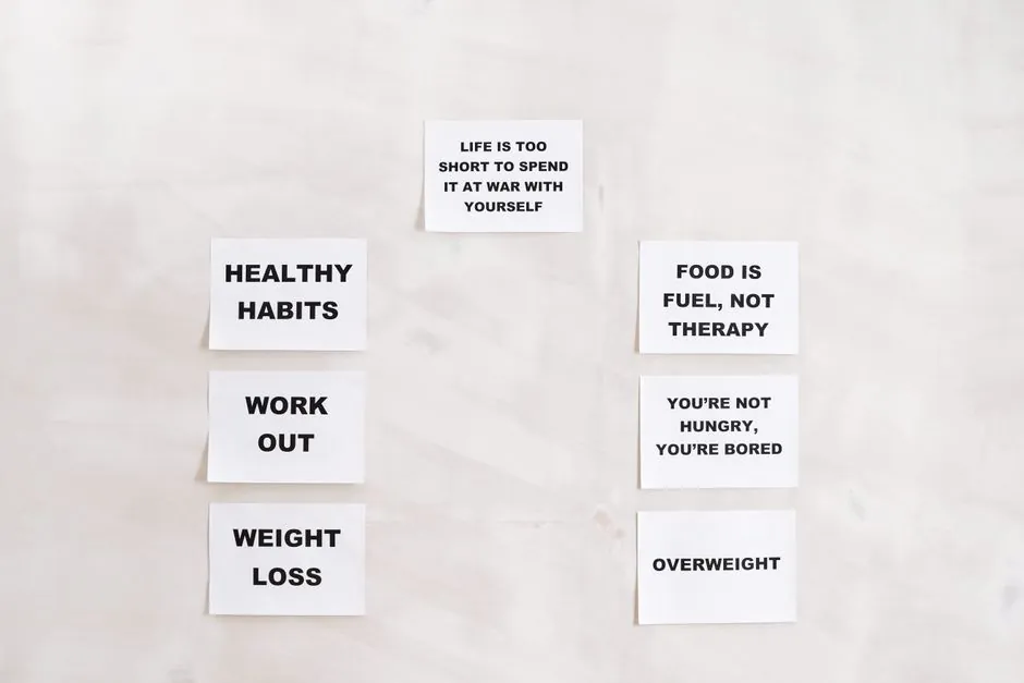 Minimalist display of motivational health and wellness quotes emphasizing healthy habits and weight management.